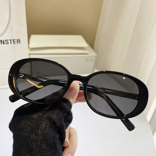 Small oval frame sunglasses for women, high-end vacation seaside anti-UV white frame polarized sunglasses personality