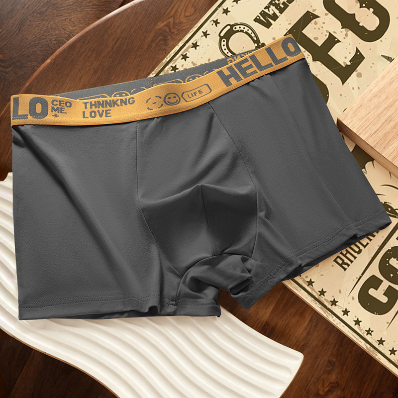 Ropa interior masculina, letras juveniles, cintura media suelta y cómoda, transpirable y sin costuras, pantalones cortos de cuatro esquinas para estudiantes al por mayor
