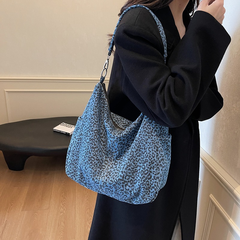 Bolso de hombro para mujer de gran capacidad de viaje casual 2024 nueva lona de moda con estampado de leopardo bolso de mensajero al por mayor