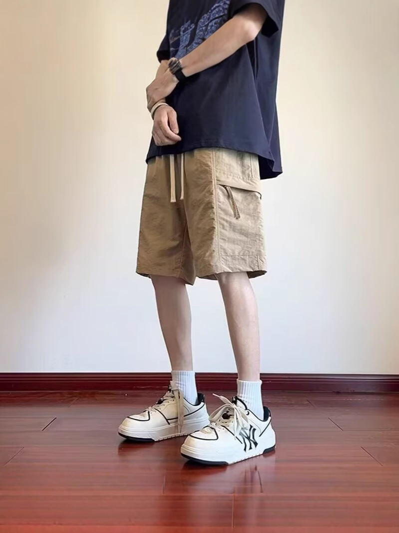 Camisas menos ropa verano nuevos pantalones cortos estadounidenses marca de moda para hombres estilo delgado sentido del diseño nicho holgado pantalones deportivos de gran tamaño