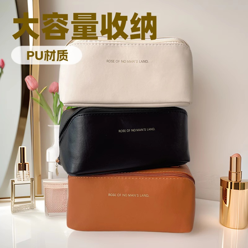 2025 nueva bolsa de cosméticos de celebridades de Internet ins bolsa de almohada de órgano bolsa de almacenamiento de Pu de gran capacidad caja de cosméticos lavado de viaje