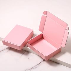 厚い特硬包装箱の薄いピンクの飛行機の箱のカラーボックスの物流の専用の牛革の紙の箱のハイエンドの服装の包装箱