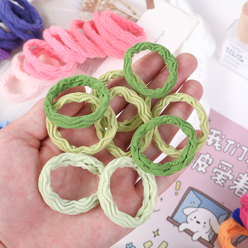 Explosiones clásicas super asequibles 10 colores anillo de cabello grueso de alta elasticidad sin costuras toalla jacquard anillo de goma cubierta de cuero