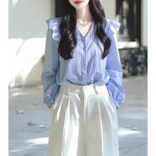 今年流行的漂亮小衫轻奢高级感法式小众绝美蓝色长袖衬衫女新款秋