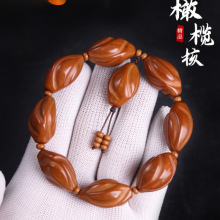 正宗天然橄榄核雕刻手串扭转乾坤无相佛光珠素珠核雕男女文玩通用