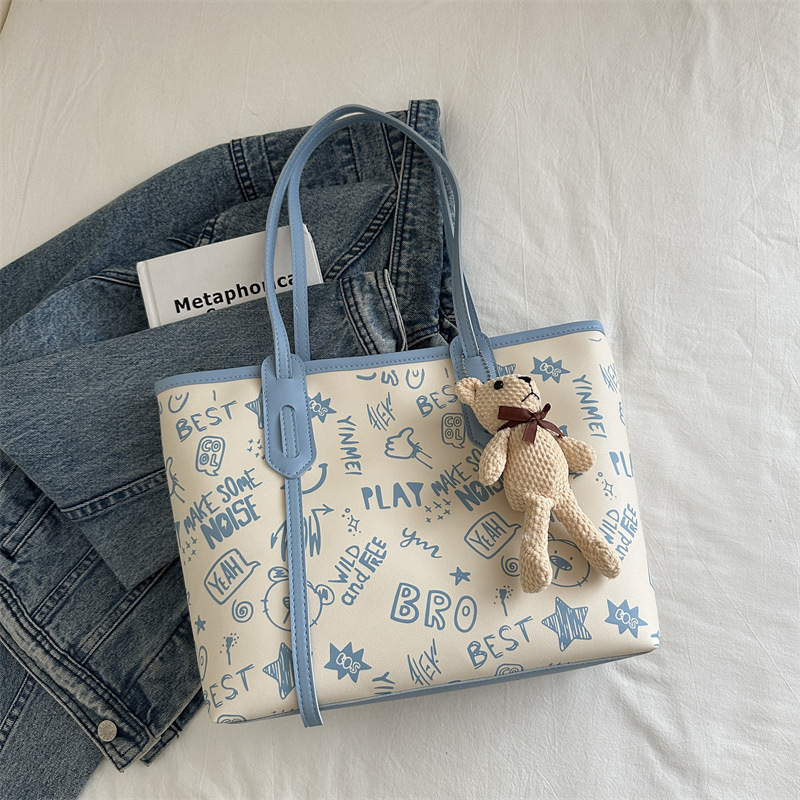 Bolsa de hombro de gran capacidad para mujeres, bolso de alta calidad, bolso grande, 2024 nuevo estilo de moda, bolso de clase de graffiti