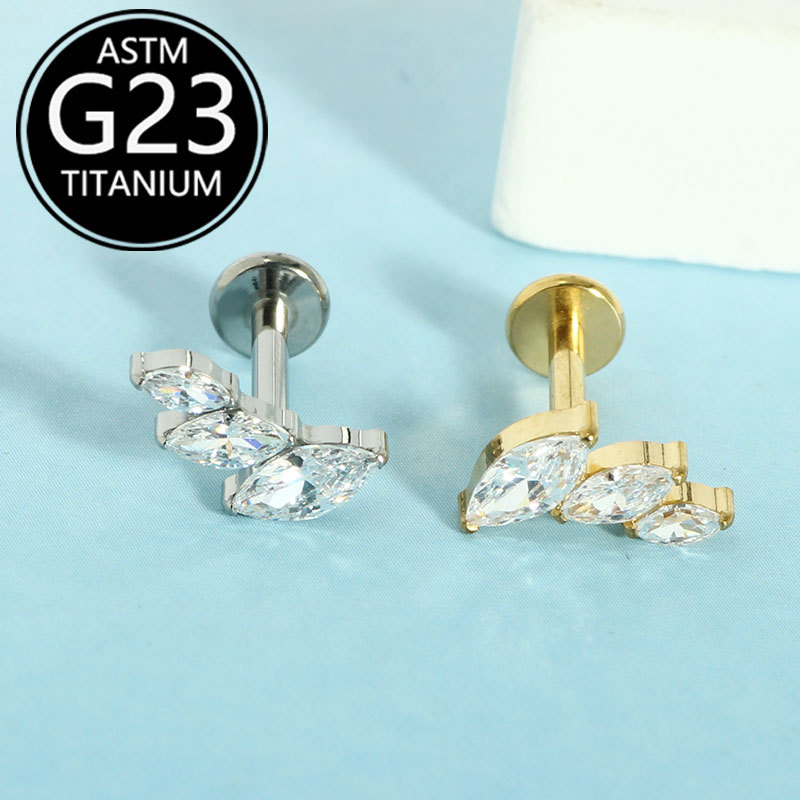 Silver pointed spike labret stud material detail