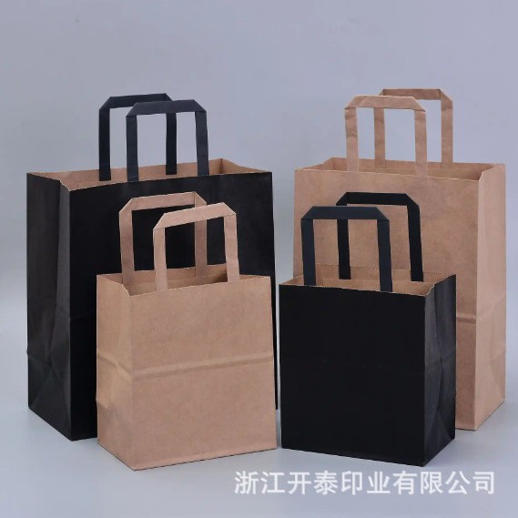 工厂可按您的设计稿大量生产彩色印刷牛皮纸绳手提纸袋子