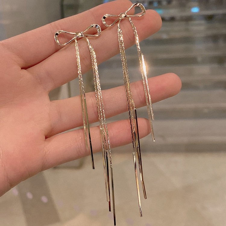 Pendientes de metal de alta gama, diseño minimalista y moderno, para mujer 2024, suministro al por mayor