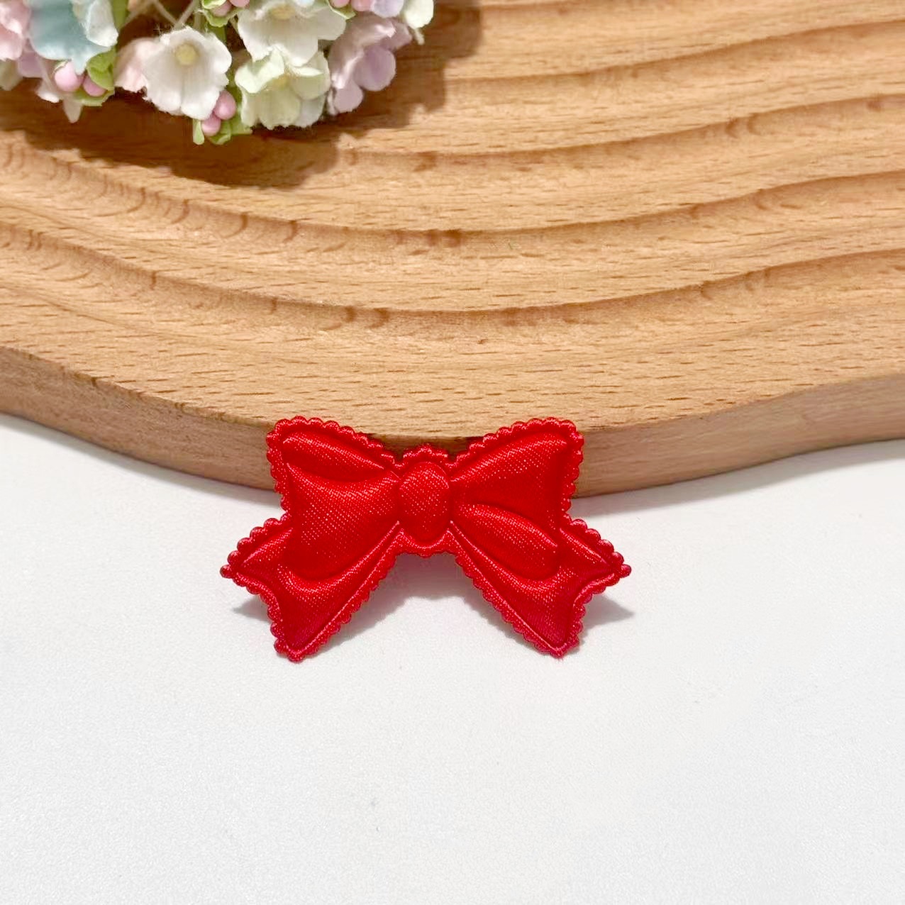 With bow, red