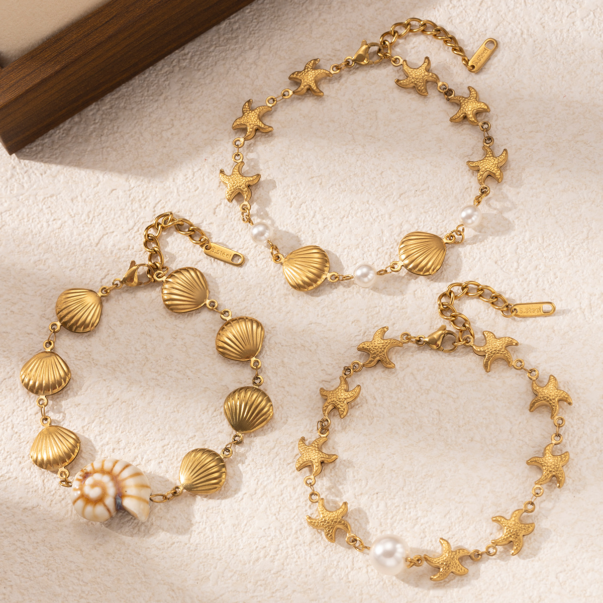 Tina Europa y los Estados Unidos venta transfronteriza pulsera de acero inoxidable ligera lujosa pulsera de estrellas de mar de alta calidad conchas marinas mujeres no desvanecen