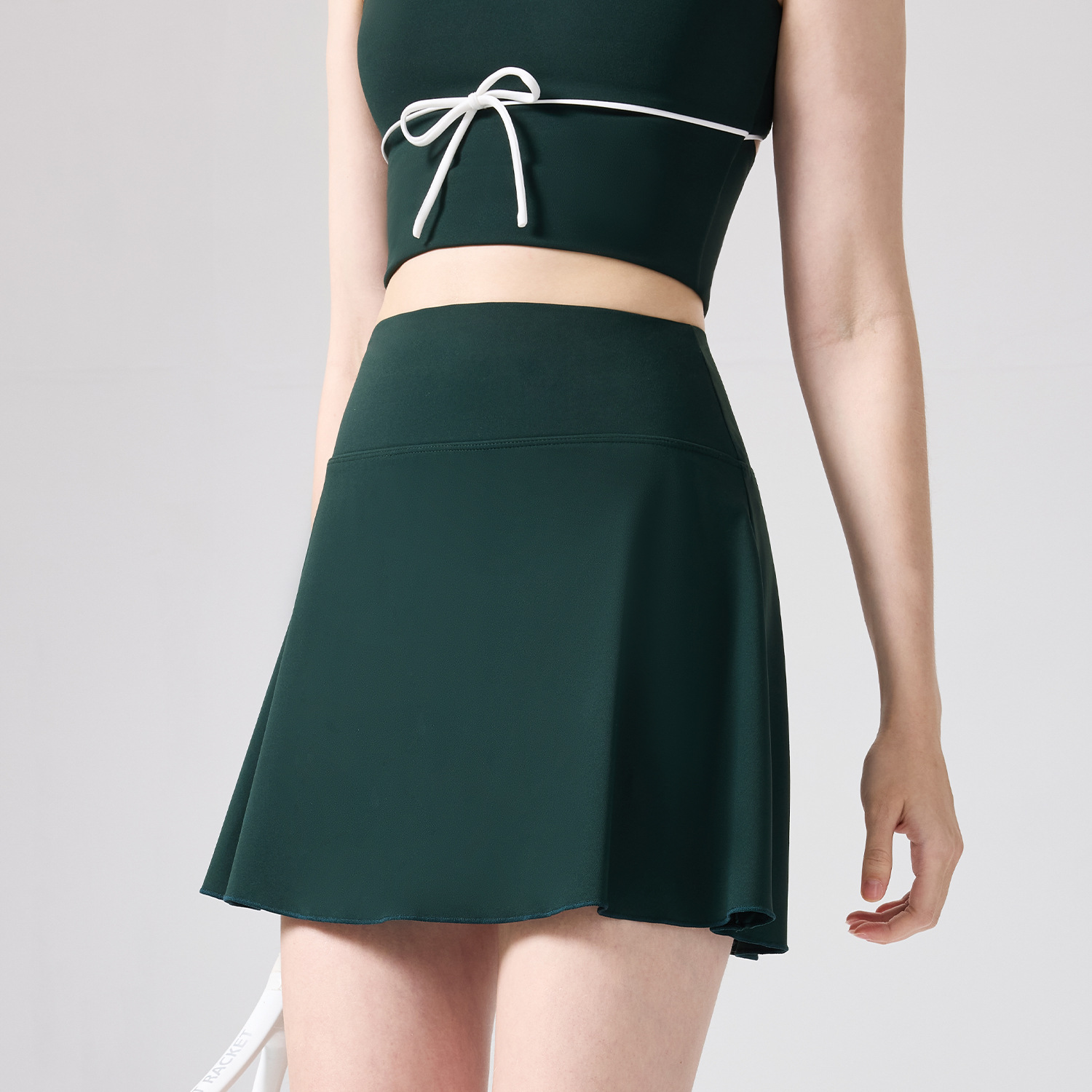 Nueva primavera y verano falda de tenis anti-caminar desnudo acondicionamiento físico correr abdomen delgado falda falsa de dos piezas falda de yoga deportivo