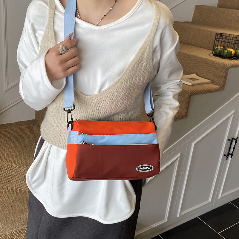 Mochila de moda para niños de color contrastante, mochila de ocio, deportes de viaje ligero, mochila de hombro para niños y niñas, nuevo tipo de bolso para niños