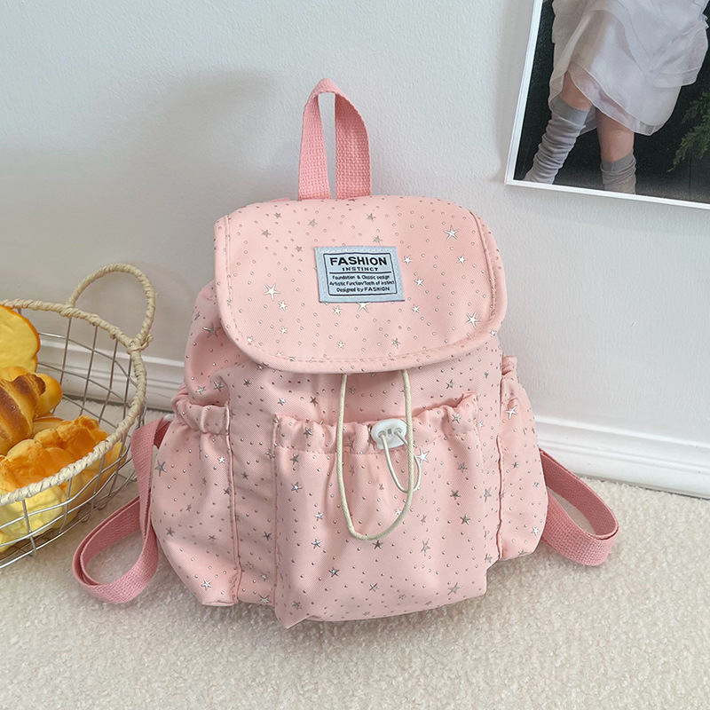 Primavera nuevo estilo ins leche de viento bonito joven estrella impresa mochila de hombro para mujeres de alto valor dulce mochila pequeña