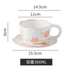 Pink flowers on white background - wavy cup and saucer