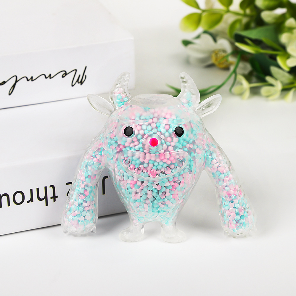 Amazon transfronterizo nuevo producto pequeño monstruo espuma partículas de descompresión amasar música divertida fábrica de juguetes de descompresión al por mayor