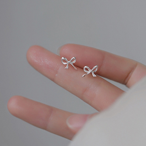 Bow tie earrings for women  trendy simple cold style internet celebrity niche design hollow earrings