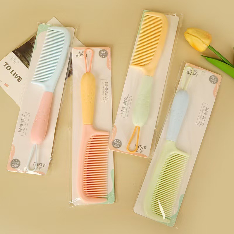 Nuevo paquete de impresión de cuerda de colgante independiente de trigo rollo de peinado de plástico peinado de belleza tienda de dos yuanes asequible