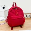 Small lights, red backpack