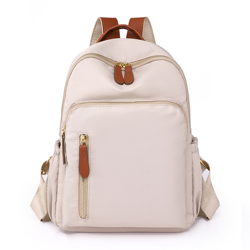 2023 nueva mochila casual para mujer de nailon moda salvaje viaje urbano mochila pequeña mochila escolar ligera al por mayor