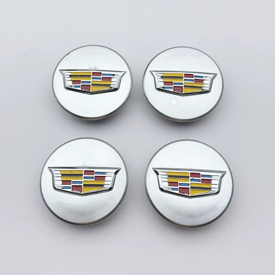 Car logo — Cap Atsl Xts Ct6 Xt5 - four-convex-silver-background-black-color-labels-67mm