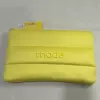 Yellow storage bag, 32