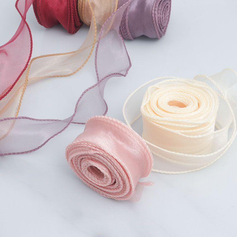 Fábrica en stock Venta caliente 4cm hilado curvado con flores material de embalaje de regalo con cinta de flores elegante hilo de cola de pescado