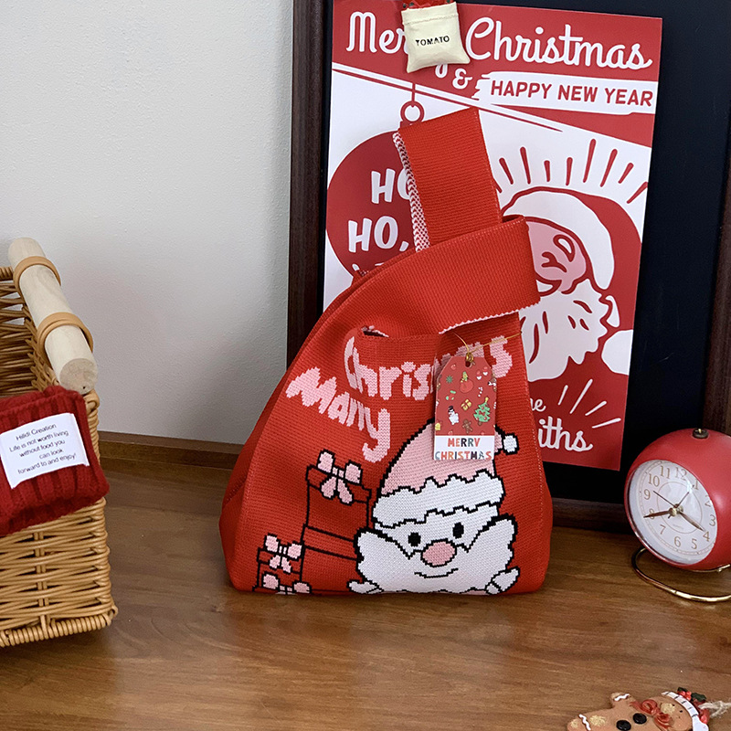 Bolsas de tejido de Navidad al por mayor bolsas de regalo de Nochebuena bolsas de dulces bolsas de regalo de empresa bolsas de mano creativas