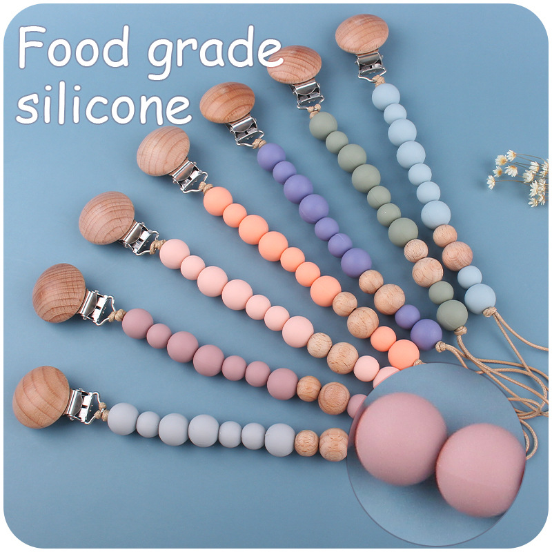 Suministros para bebés calmante clip de chupete de haya cuentas de silicona para bebés mordedura Cadena de chupete cadena anti-caída Nuevo Amazon