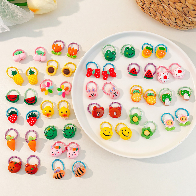 Los niños de la banda del pelo del bebé de la historieta no lastiman la banda de goma del pelo de la niña volumen del pelo menos cuerda del pelo del bebé