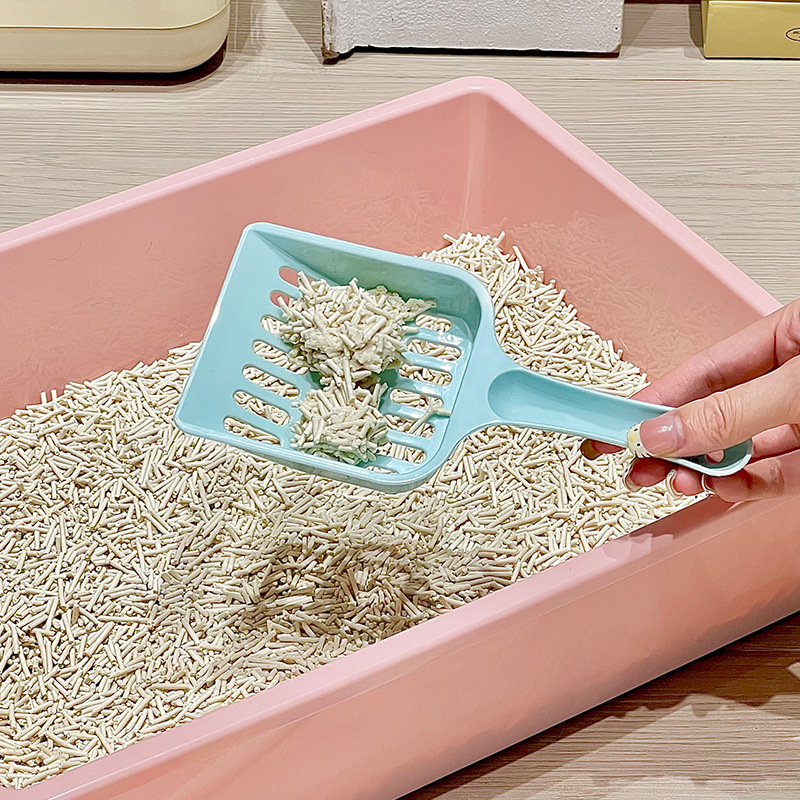 Fábrica de pala de arena para gatos venta directa de plástico para gatos limpio y simple para decollar el inodoro de malla hueca para gatos al por mayor