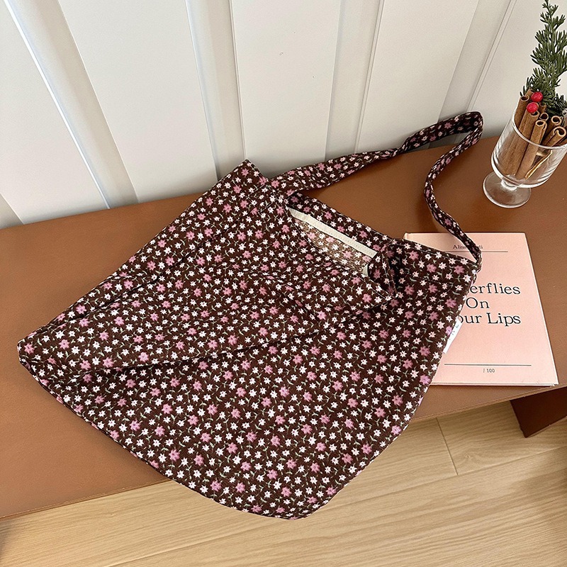 Diseño nicho bolsas de lona para mujeres 2025 nueva gran capacidad coreana estampado de leopardo flor de hombro impresa bolsas de mujer