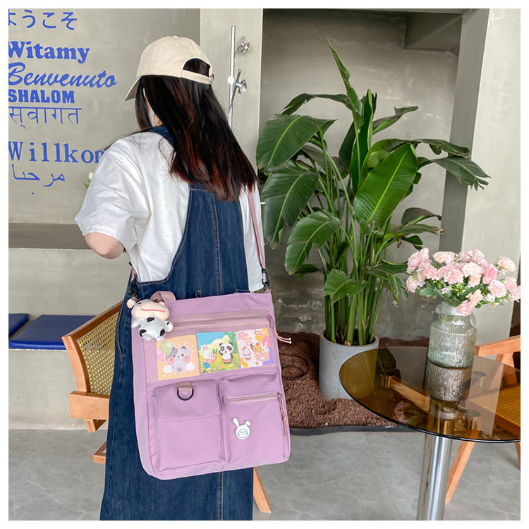 Large-capacity Japanese-style single-shoulder canvas bag for girls, versatile crossbody, ins, a tote bag for junior high school students' classes, and a schoolbag for after-school tutoring undefined