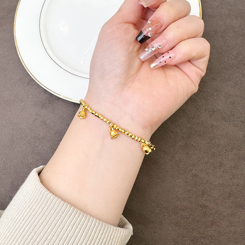 Brazalete de oro de arena de Vietnam lujoso ligero bungee ojo de gato mariposa campana de cuatro hojas brazalete joyería de aleación de cobre al por mayor