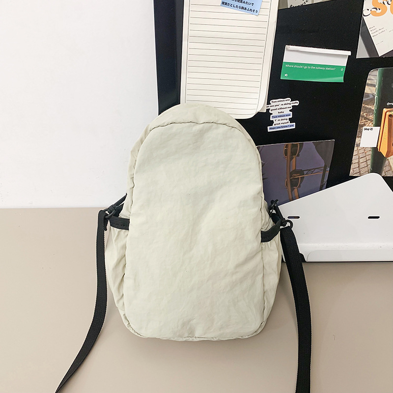 Solid-color nylon fabric bag for women, Spring 2025 new niche waist bag, ins casual pleated phone bag, crossbody bag for women undefined
