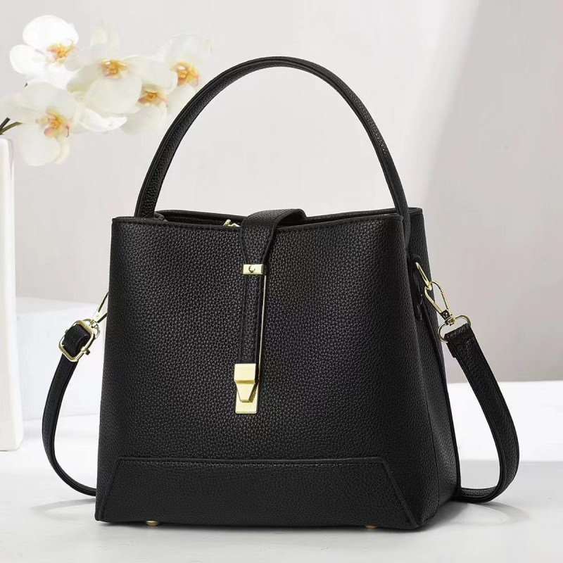 Fabricante bolsos de mujer 2025 nuevo bolsos de mano texturas coreanas de hombro de una sola forma de bolsos de cubo de mujer bolsos