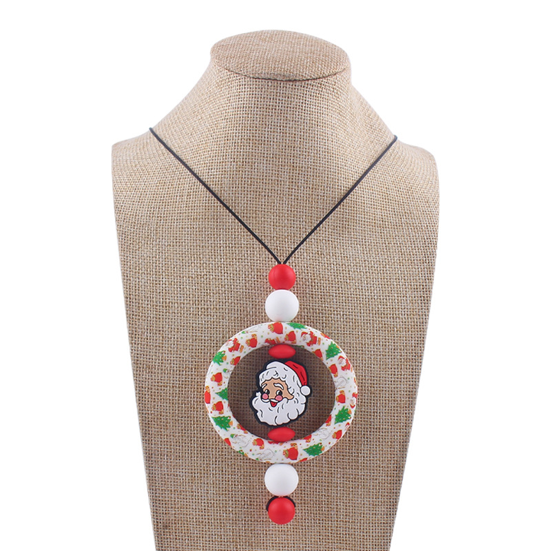 Bebé de dibujos animados de Navidad collar bebé creativo de silicona Santa Claus mordedura COLLAR COLGANTE hecho a mano