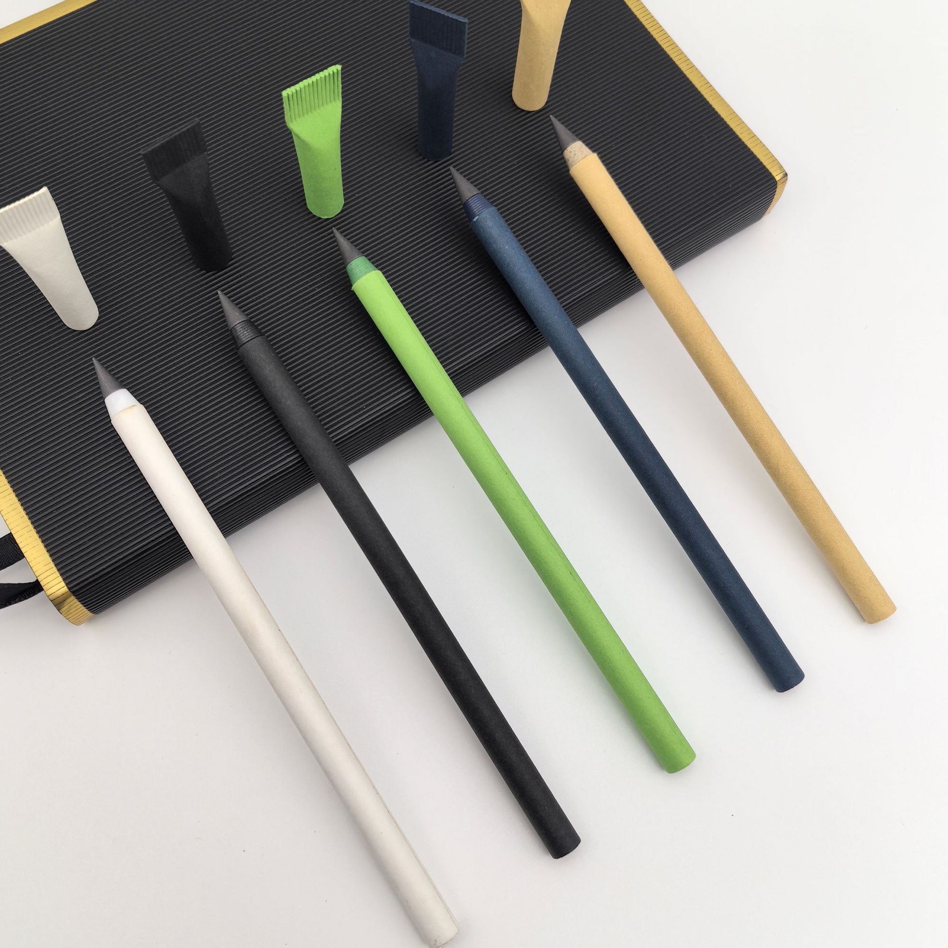 Ventas transfronterizas de lápiz eterno de protección ambiental no puede escribir lápiz de tubo de papel bajo precio negro tecnología lápiz eterno al por mayor