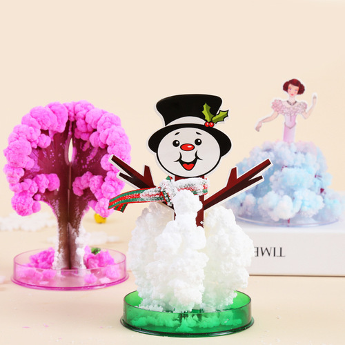 Magic Christmas tree, paper tree grows, snowflakes bloom, magical watering grows, crystallizes, colorful Christmas gifts
