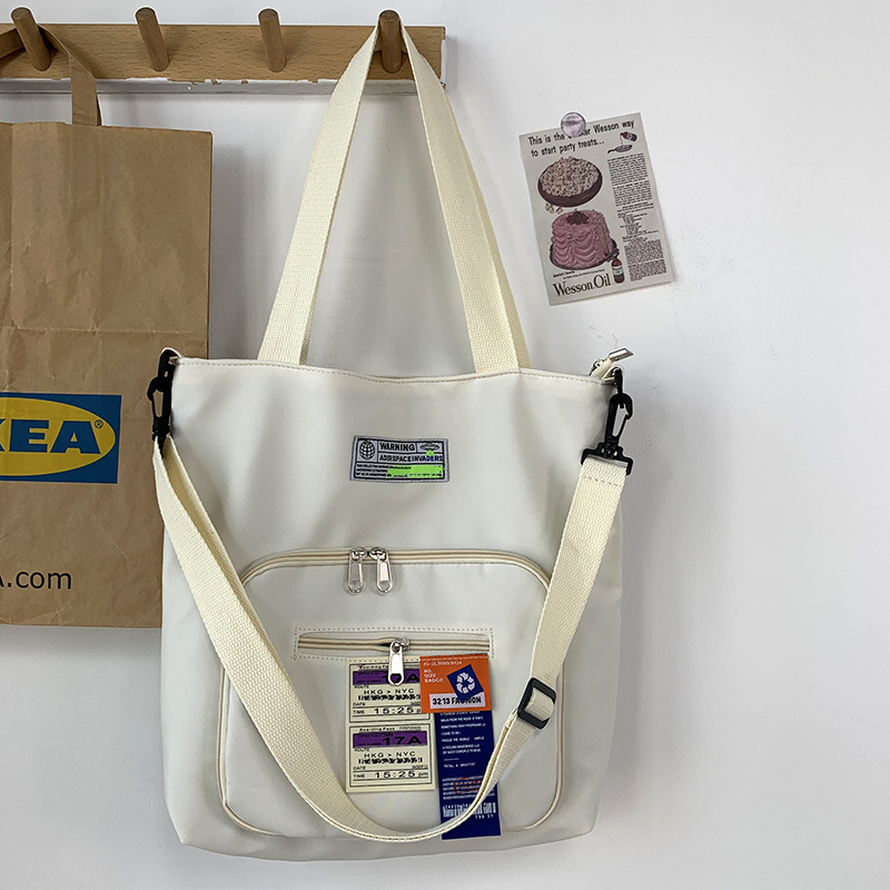 Nueva crossbody bolsa de lona de las mujeres de hombro de gran capacidad portátil estudiante moda nylon bolsa de lona bolsa de viaje bolsa