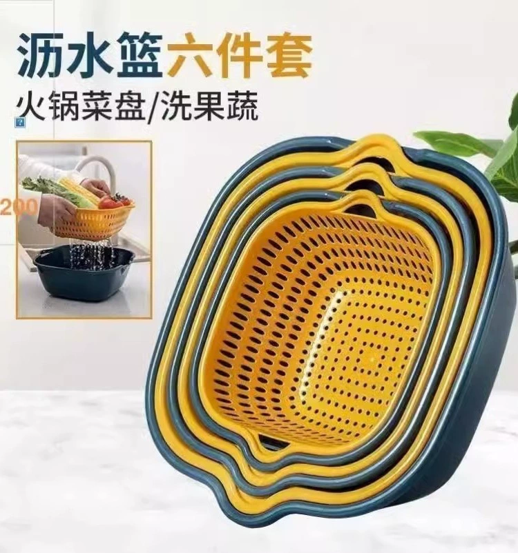 Набор кухонной утвари с кастрюлями, сковородками, мисками, дуршлагом, домашней тарелкой для фруктов, корзиной для фруктов и овощей, а также трехкомпонентным набором посуды.