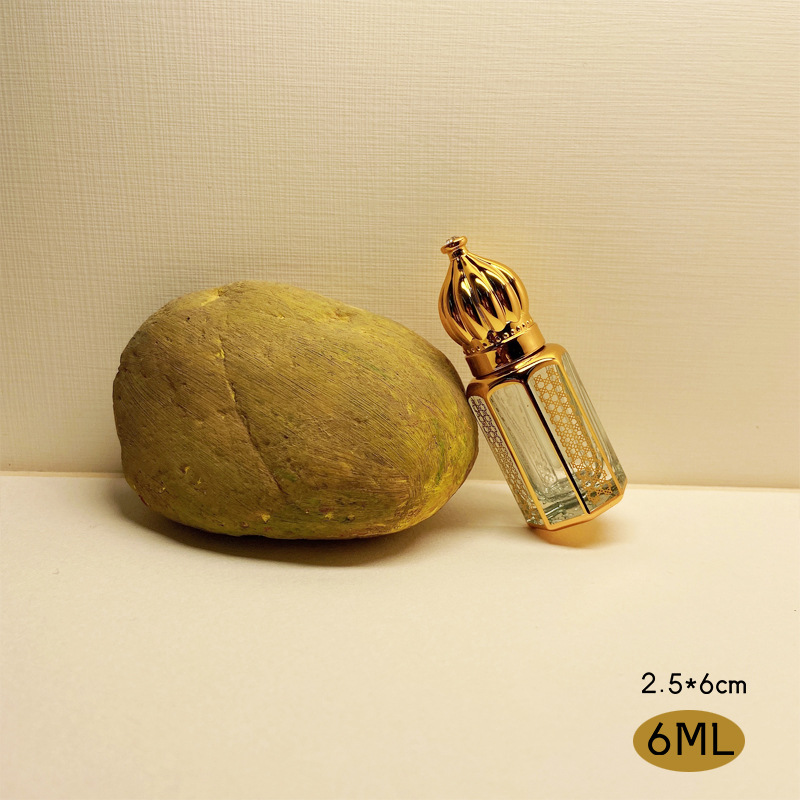 Dubai Perfume Aceite Esencial sub-botella artificial cristal artesanía metal transparente botella de perfume de vidrio dorado al por mayor