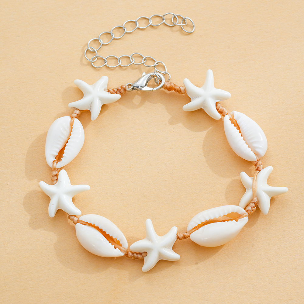 Europa y América playa viento marino tejido a mano pulsera conchas de estrellas de mar nicho simple estilo versátil personalidad