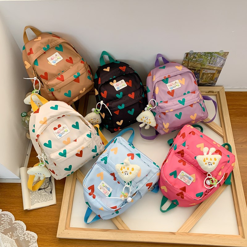 Mochilas escolares de jardín de infantes para estudiantes de escuela primaria Dulce y cariñosa mochila para niños y niñas 2025 nueva mochila para niños de excursión