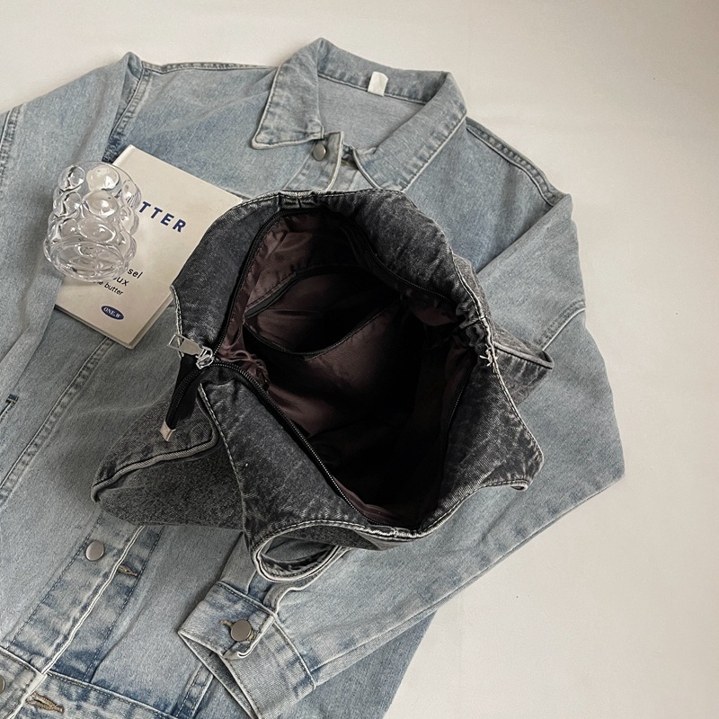 Bolso de viaje retro de mezclilla de alta gama, bolso de viaje de marca de moda de moda femenina, bolso de axila de hombro simple y casual de gran capacidad