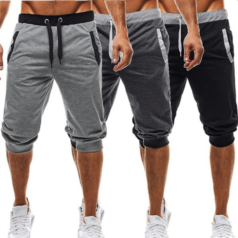 wish foreign trade new European and American men's casual sports slim fit color matching fitness jogging five-point pants wish foreign trade new European and American men's casual sports slim fit color matching fitness jogging five-point pants