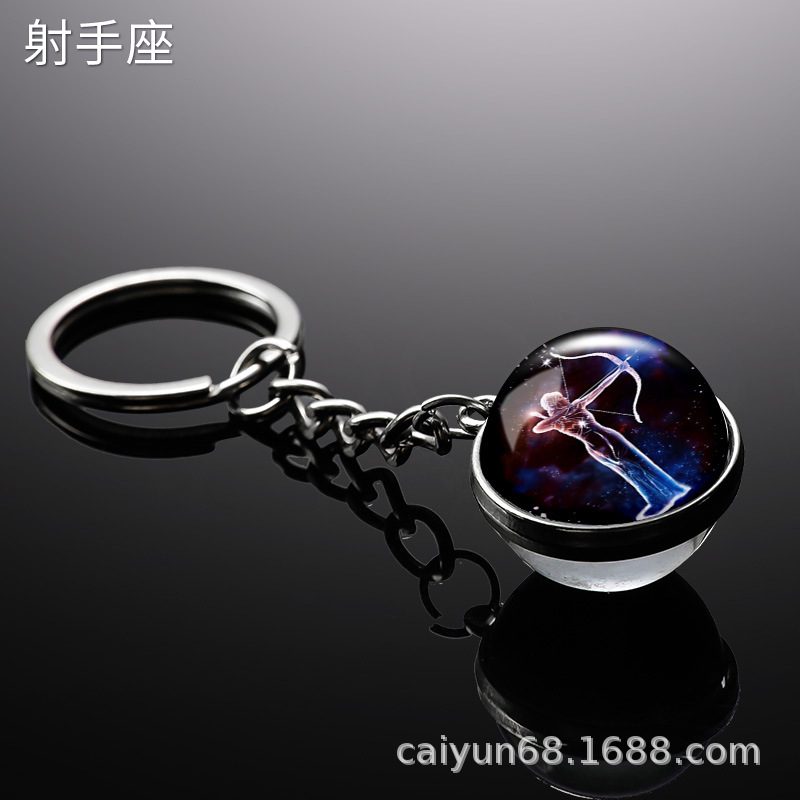 Transfronterizo 12 constelaciones de luz nocturna bolsos colgantes de bolsas de joyas de tiempo doble cara bola de vidrio llavero al por mayor