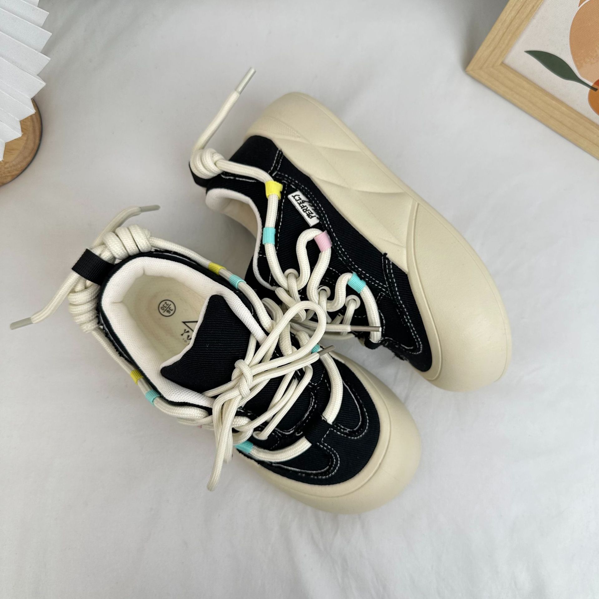 Zapatos de pan de fondo grueso de larga onda para mujeres 2024 otoño japonés coreano, zapatos de patineta de cabeza redonda, zapatos de lona