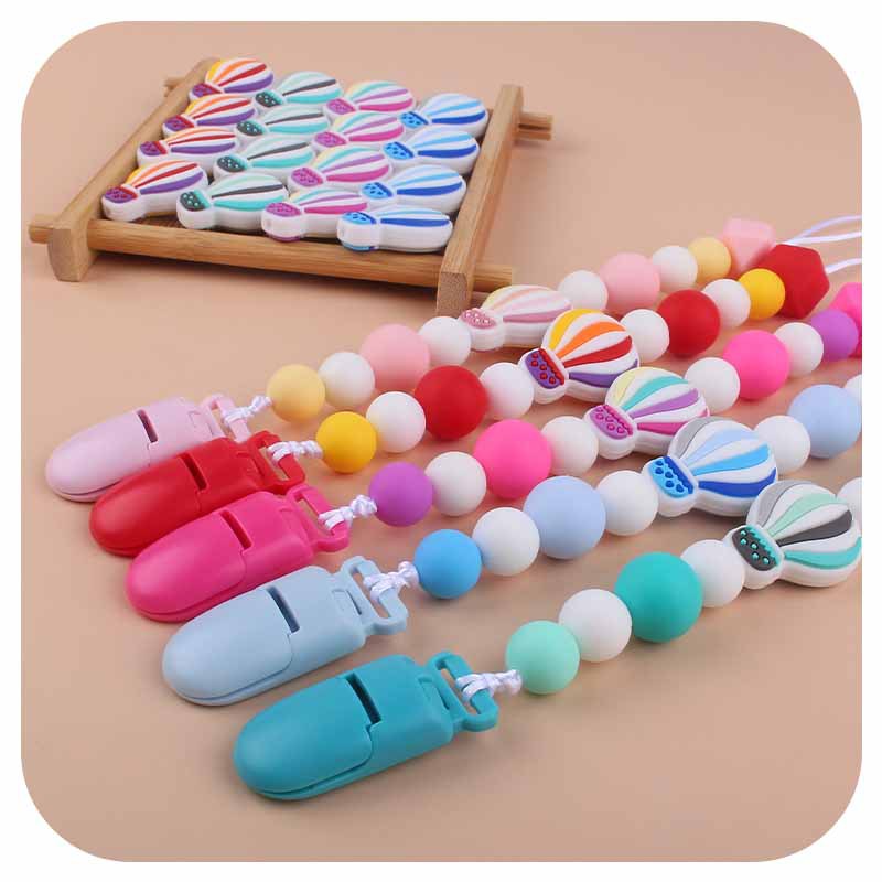 Bebé dibujos animados colorido globo de aire caliente silicona teether bebé teether palo juguete teether pezón cadena anti-caída