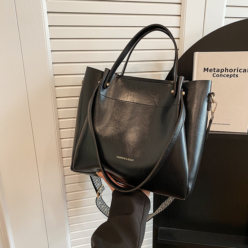 Borse da donna 2026 Nuovo modello Semplice Moda Borsa a tracolla grande capacità Vintage Tote_voghion.com